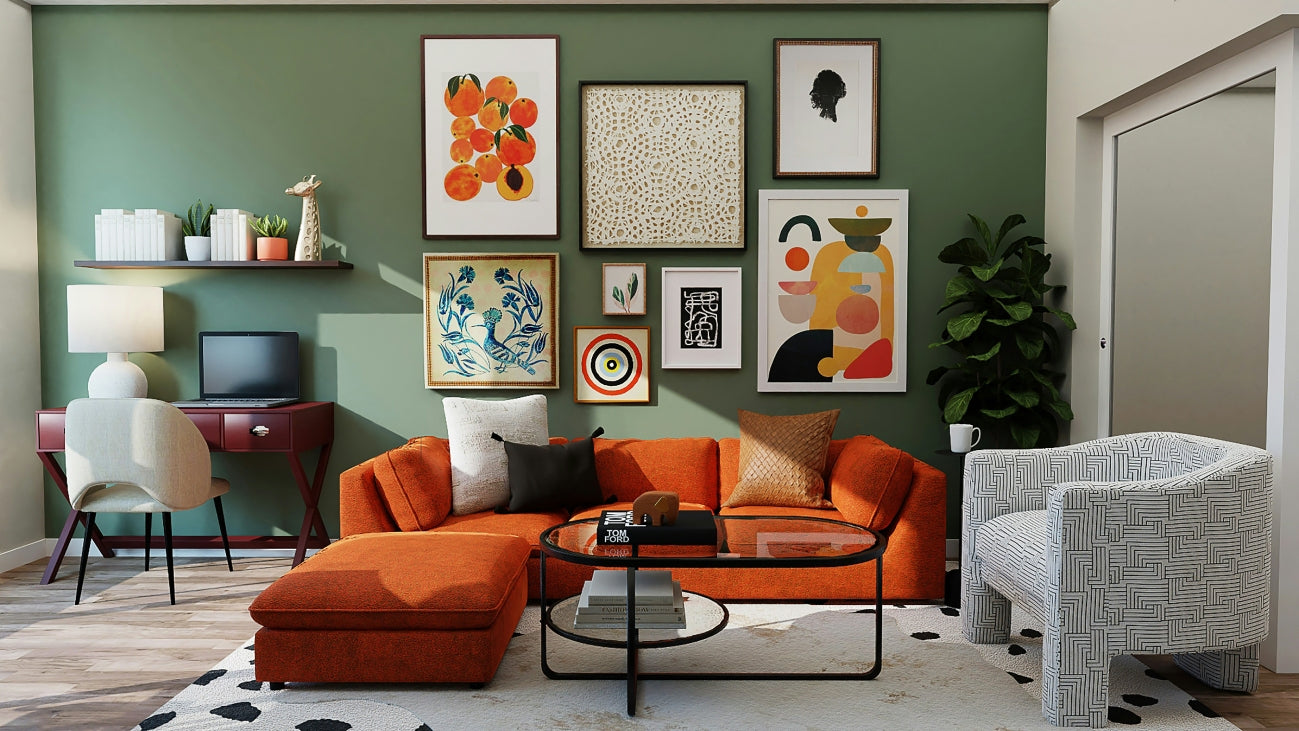 Modern living room interior featuring an orange sectional sofa, patterned armchair, glass coffee table, wall gallery with abstract art, green accent wall, indoor plant, and stylish desk setup – Novita Casa home décor inspiration.